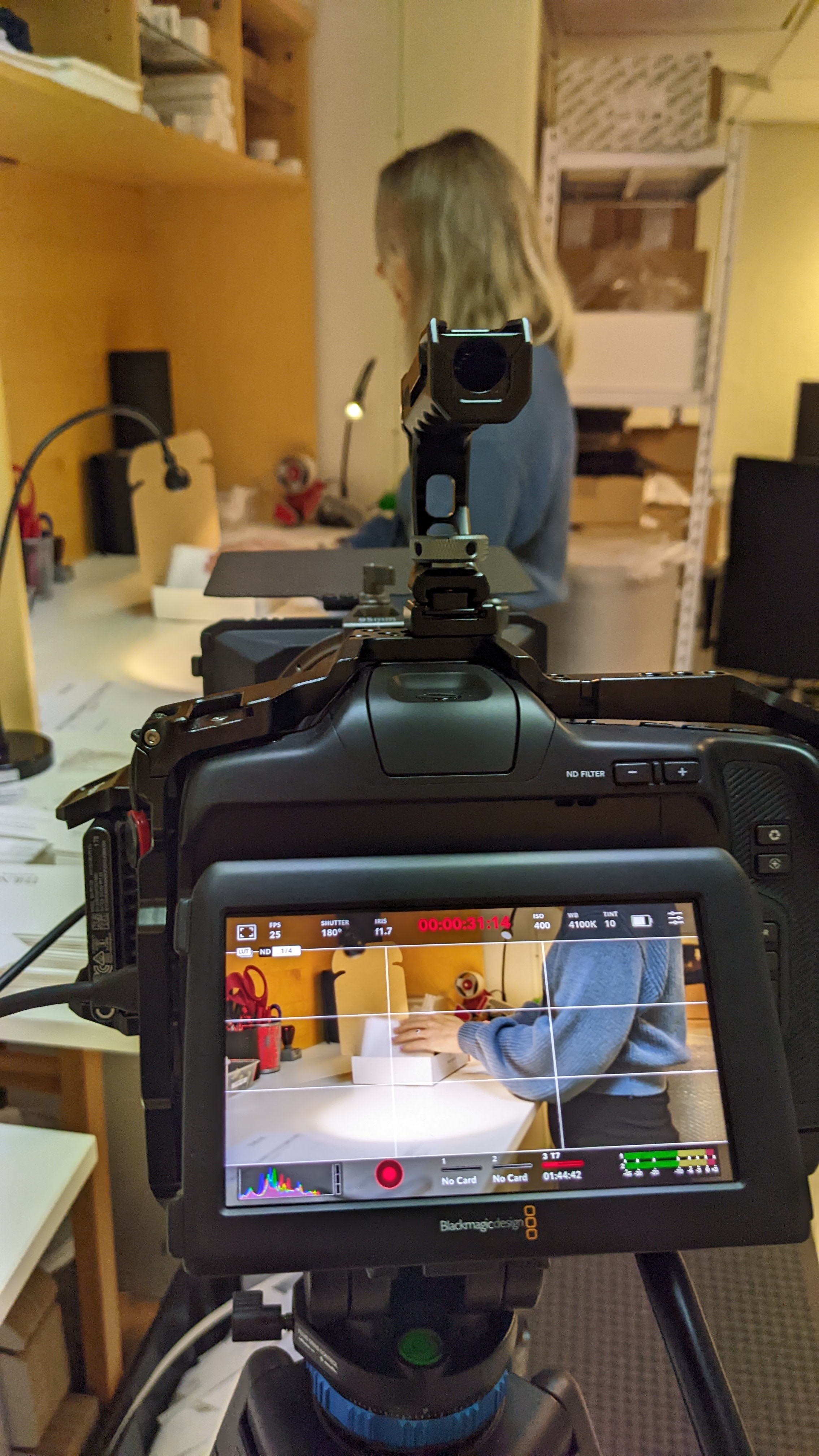 Professional camera equipment setup in office environment